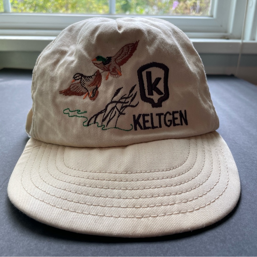 Vintage Keltjen tan embroidered snap back hat. Size large/X-Large. Made in USA